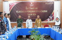Pj Gubernur Limbong Rakor Kesiapan Pemilu Dengan KPU Papua